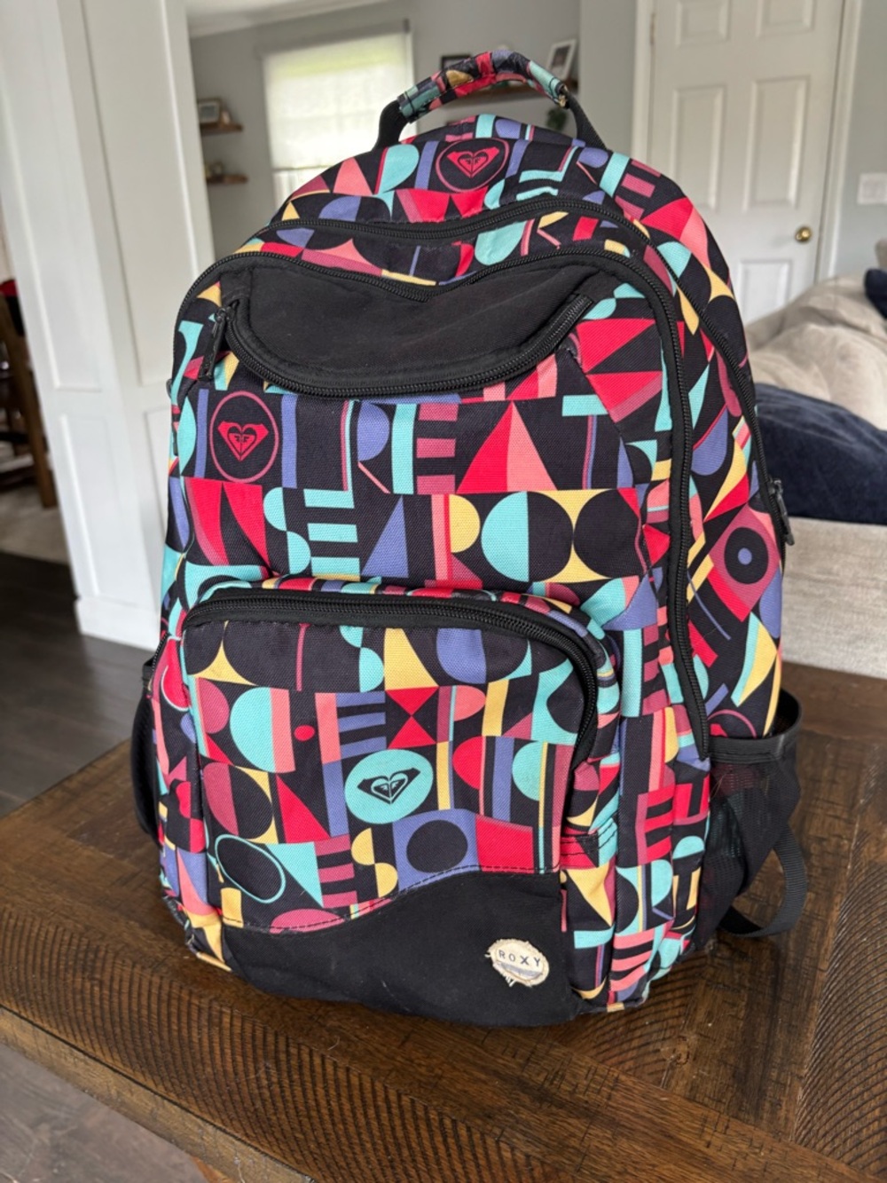 Roxy Neon Geometric Print Backpack in Black, Red, Teal, Yellow, Purple